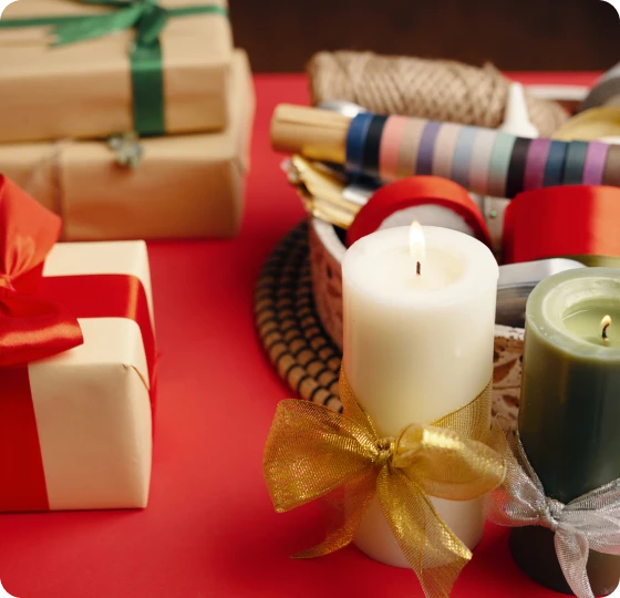 Holiday candles with gift boxes